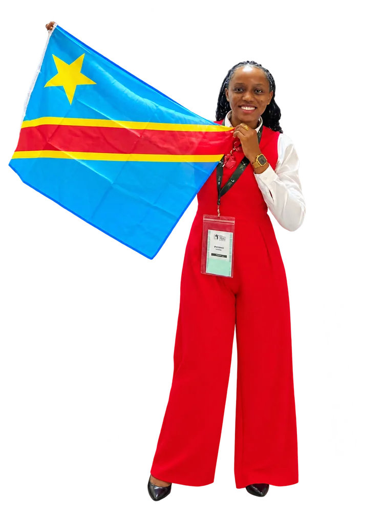 Représentante congolaise tenant le drapeau de la RDC au Deep Learning Indaba 2026